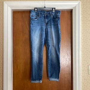Gap size 8 jeans. Ankle cut/rolled ankle. Have some stretch to them.